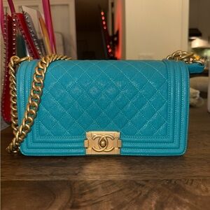 CHANEL Blue Quilted boy bag with Gold Chain